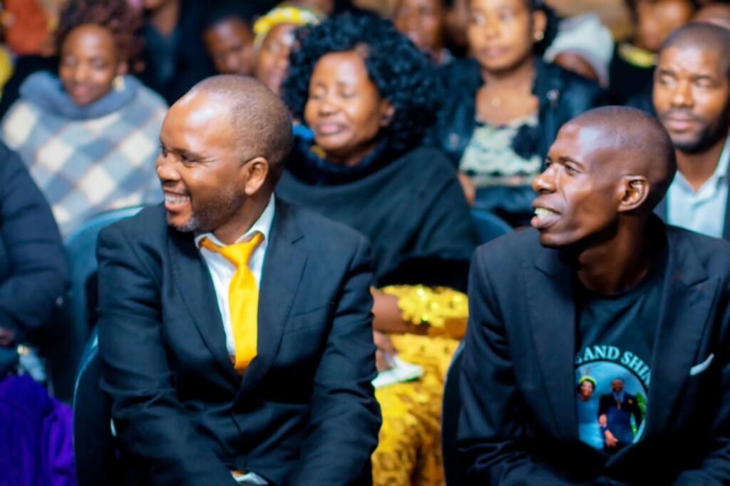 Members smiling during a TCI assembly service