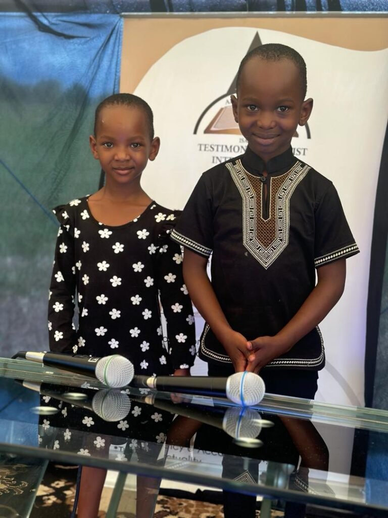 Two children at a TCI service