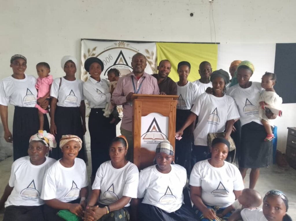 TCI DR Congo members gathered around the pulpit