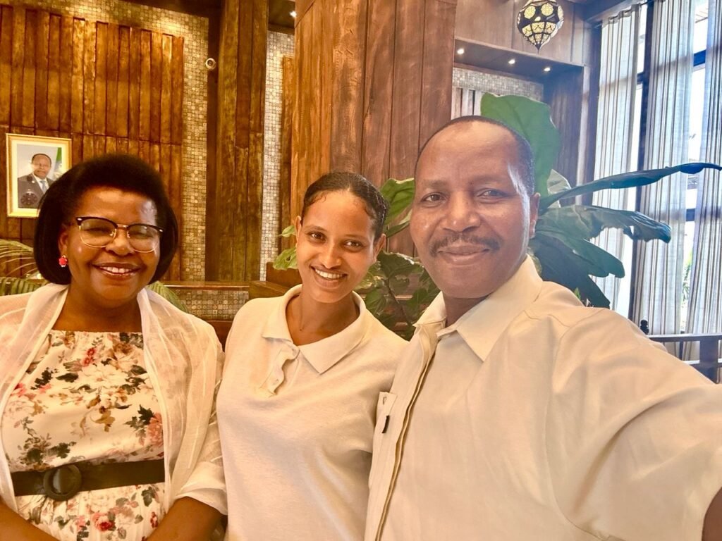 TCI leaders with a friend during the Great Commission Global Tour