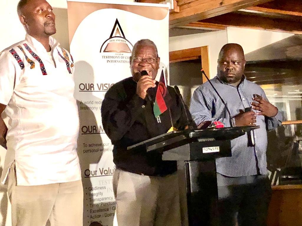 Ministers speaking at the pulpit at TCI Malawi