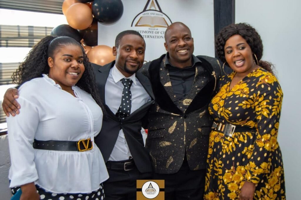 Two TCI couples together at a TCI celebration
