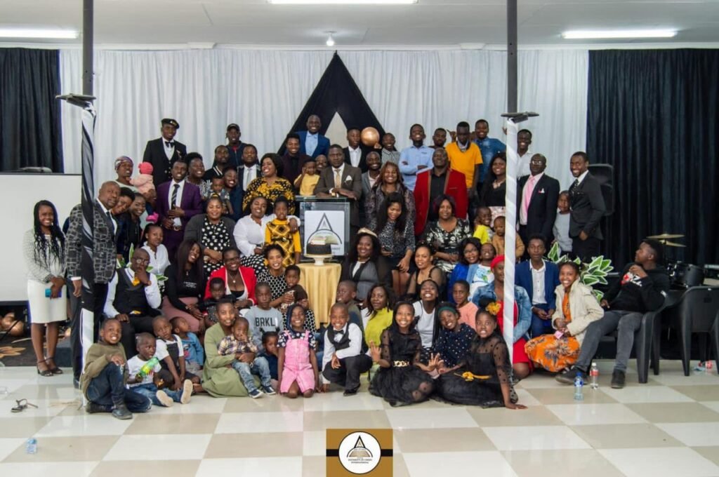 The TCI church family gathered for a group photo with the children in front